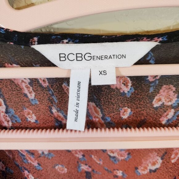 BCBGeneration Long Sleeve V Neck Floral Ombre Semi-Sheer Fall Button Up Romper - Picture 3 of 10